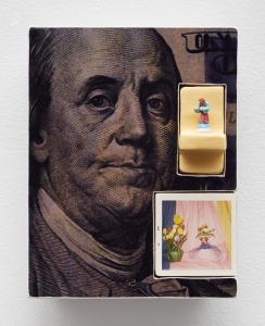 Mixed-media collage of a hundred-dollar bill close up, a small figurine perched on a stand and an image of flowers inserted
