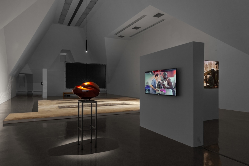 A close-up of cardboard on dirty glass, the word